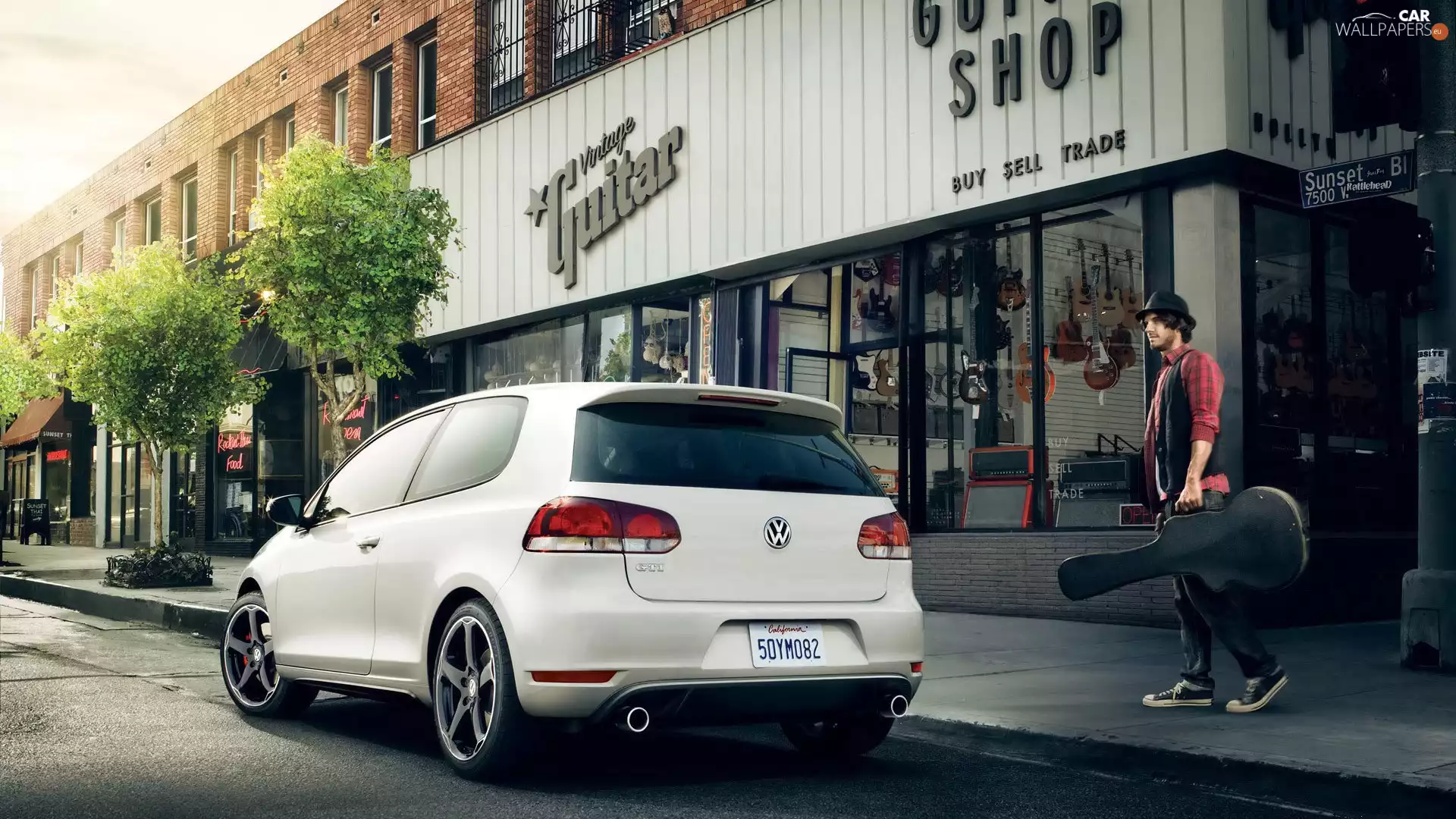 Volkswagen Polo GTI, a man, Guitar, Street
