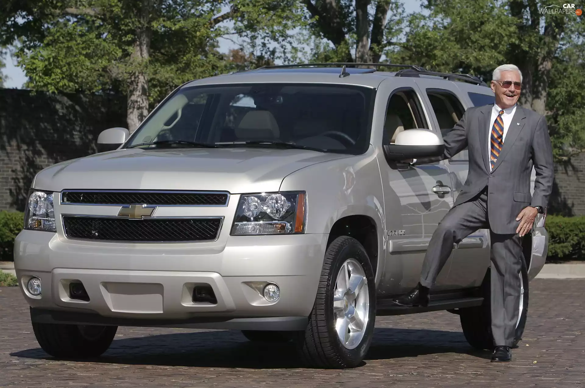 a man, Chevrolet Tahoe, commercial