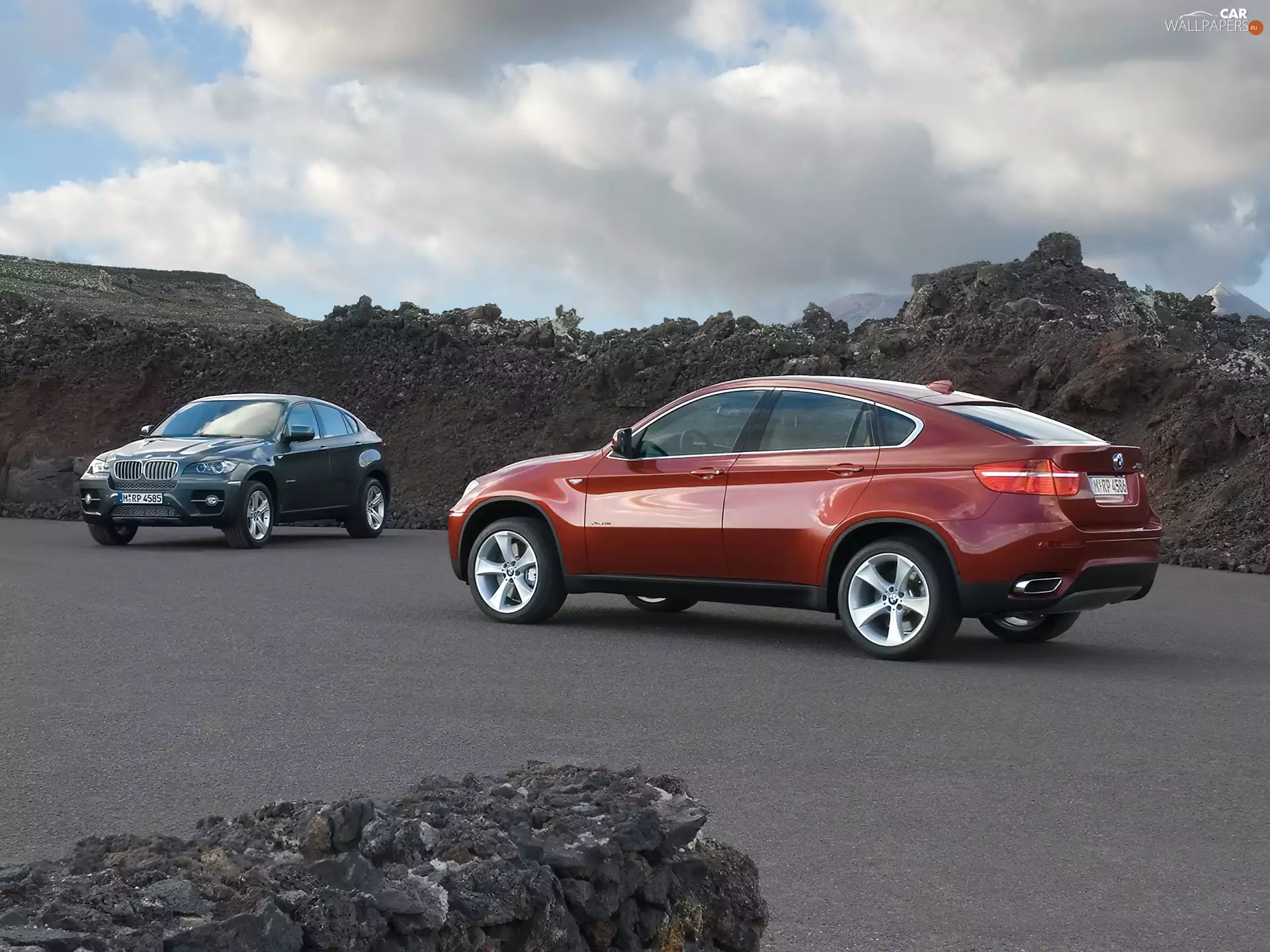 Two cars, BMW X6
