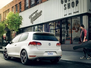 Volkswagen Polo GTI, a man, Guitar, Street