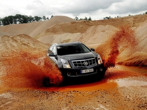 Sand, Cadillac SRX, water